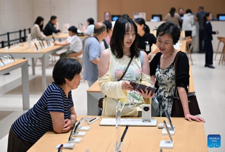 Customers shop at duty-free shopping mall in Sanya, China’s Hainan-Xinhua